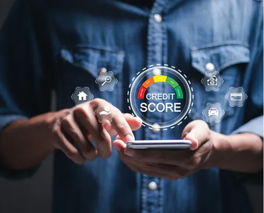 A man on his phone showing the credit score