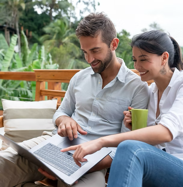 A couple looking at a computer screen