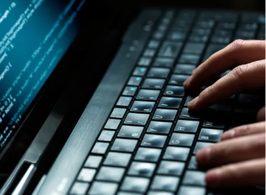 A man on his phone showing the credit score